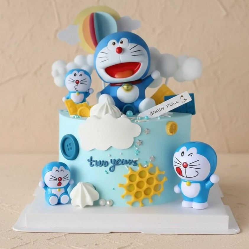Adorable Doraemon birthday cake Singapore with playful figures, perfect for a child's birthday celebration.