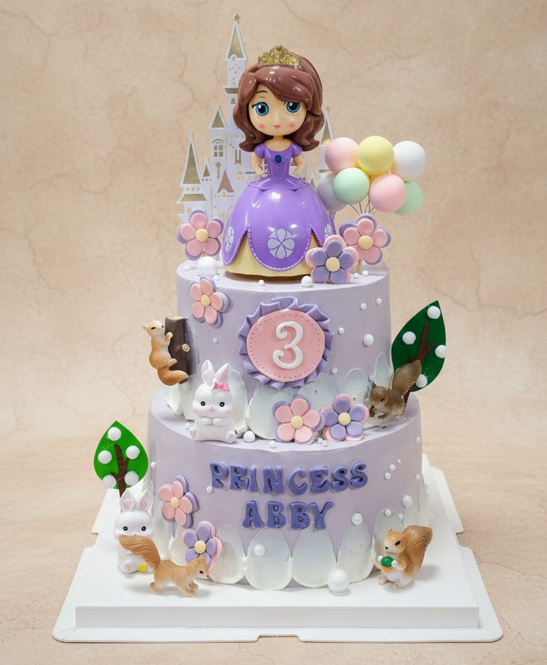 Enchanted princess cake Singapore featuring Princess Abby figurine and whimsical decorations.