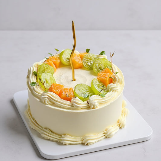 Golden Orchard Cake Singapore with fresh fruit toppings and elegant ivory cream frosting.