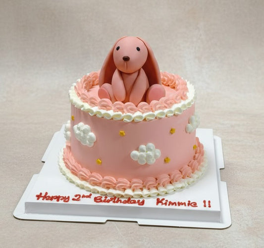 Pink Bunny Cloud Cake decorated with fluffy clouds and a cute bunny for a birthday celebration.