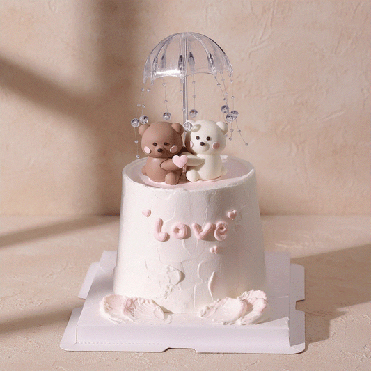 Cute Bear Cake with brown and white teddy bear couple holding pink heart under crystal dome umbrella with pink love lettering