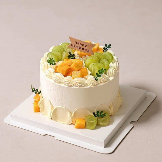 Golden cake with fresh Shine Muscat grapes and mango cubes